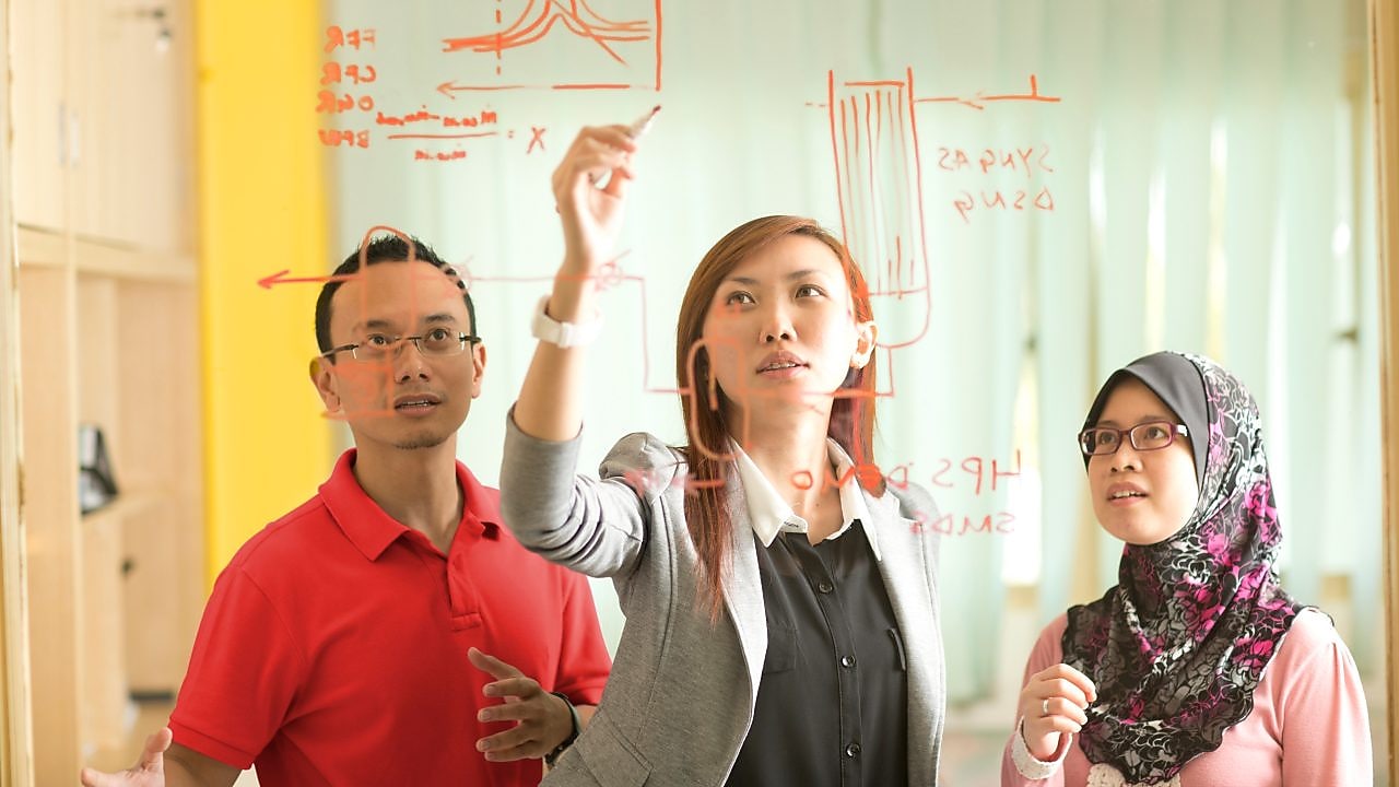 businesswoman writing on glass malaysia