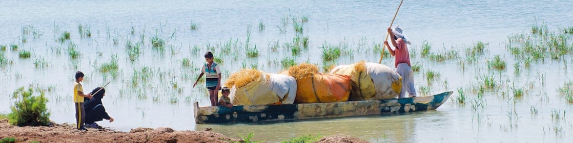Local people on the Yabani Canal in the South of Iraq