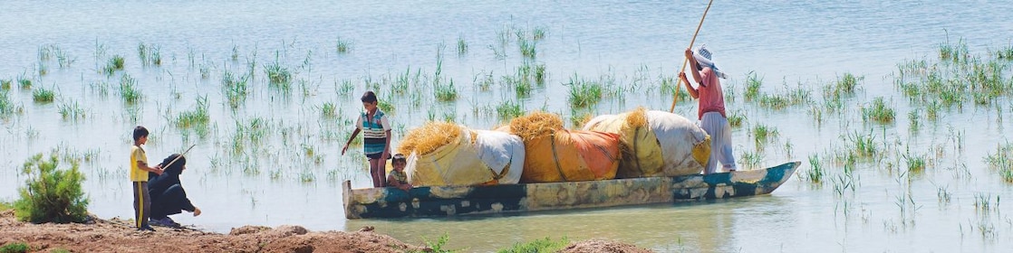 Local people on the Yabani Canal in the South of Iraq